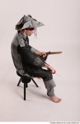 JACK PIRATE SITTING POSE WITH GUN AND DAGGER